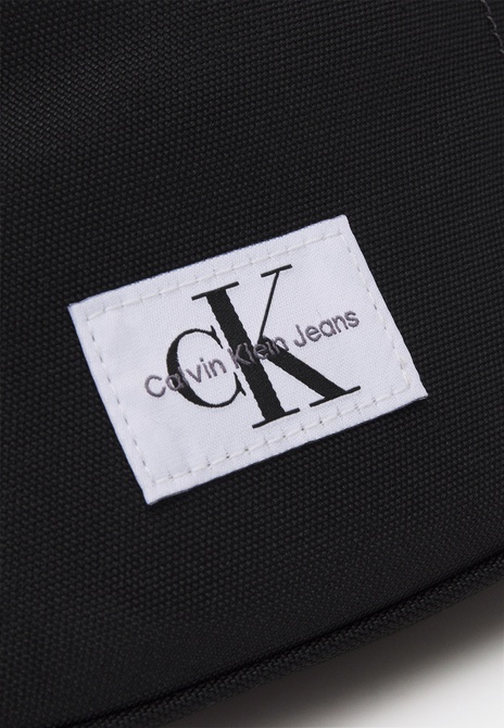 SPORT ESSENTIALS UNISEX - Belt Bag BLACK Calvin Klein — Фото, Картинка BAG❤BAG Купить оригинал Украина, Киев, Житомир, Львов, Одесса ❤bag-bag.com.ua