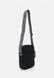 SURPLUS REPORTER UNISEX - Crossbody Bag BLACK TOMMY HILFIGER — 2/5 Фото, Картинка BAG❤BAG Купить оригинал Украина, Киев, Житомир, Львов, Одесса ❤bag-bag.com.ua