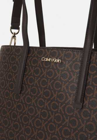 Calvin Klein MUST MONO - Tote bag - brown 